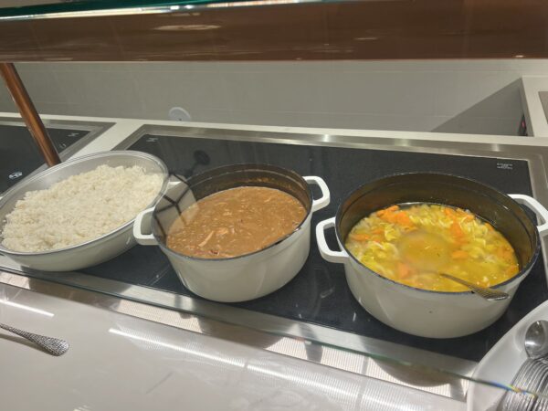 The restaurant now features Tiana's gumbo (center) which goes well over rice.