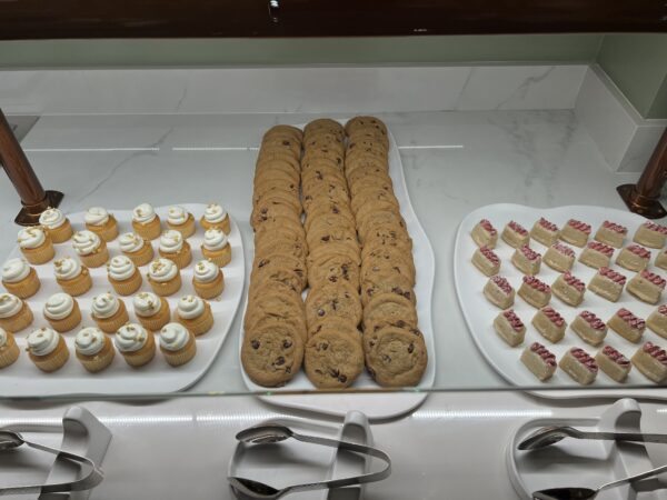 Pastries include chocolate chip cookies and vanilla cupcakes.