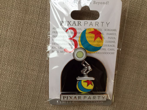This pin commemorates the two pixar icons: the light and the ball!