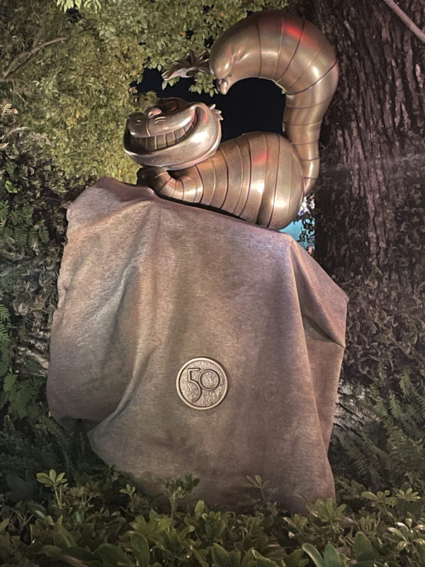 The Cheshire Cat (15) is appropriately perched in a tree!