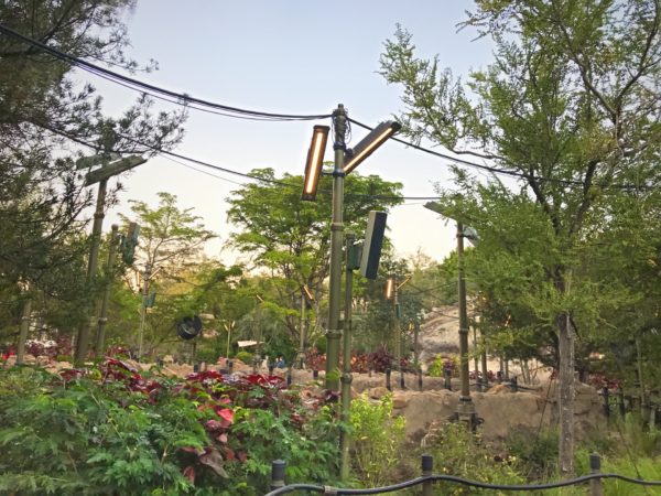 There are wires and makeshift lighting strung everywhere.