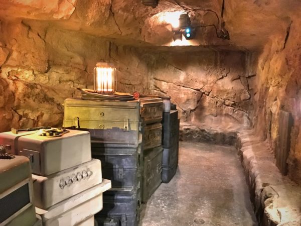 The queue is long and winding with lots of boxes and cargo spread throughout. There's also some built in seating!