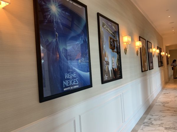 These movie posters line the hallway on the first floor in front of the formal lawn.