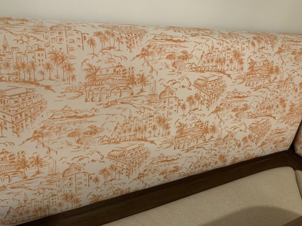 Speaking of the dining table, the benches have Riviera designs in the upholstery!