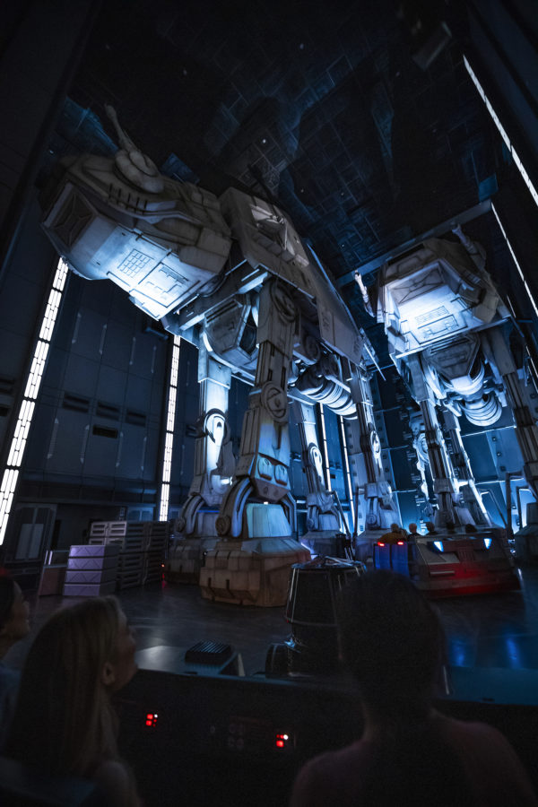 Guests race past massive AT-AT walkers aboard the First Order Destroyer. Photo credits (C) Disney Enterprises, Inc. All Rights Reserved.