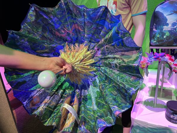 Umbrella where the underside depicts the sky in Navi River Journey in Pandora. Cool!