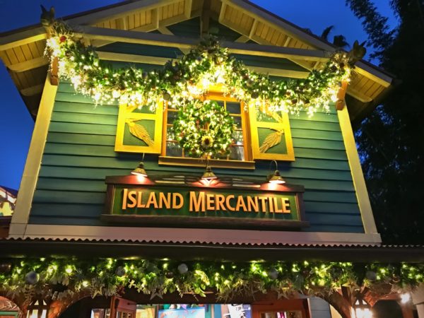 The Island Mercantile shop glows at night.