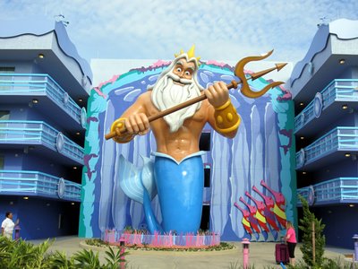 King Triton stands nearby.