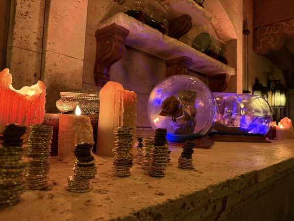 Soft lighting and candles are everywhere.