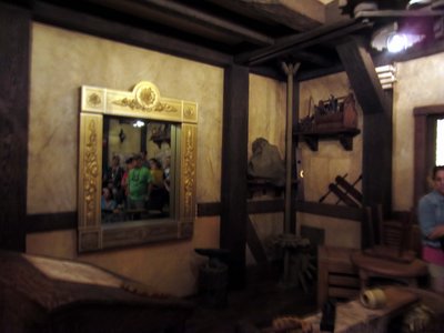 belle-mirror-portal The mirror magically transforms into a doorway that you walk through.