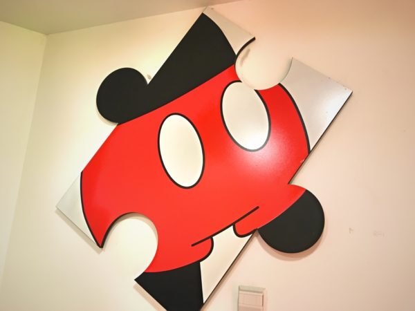 Fun and colorful Mickey-inspired art covers the walls.
