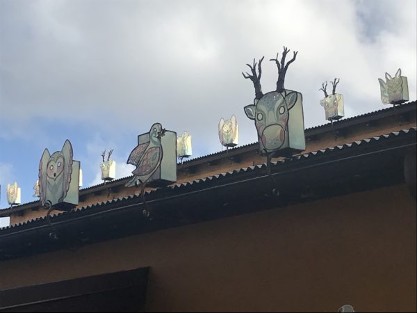 Animal decorations line the rooftops in Discovery Island.