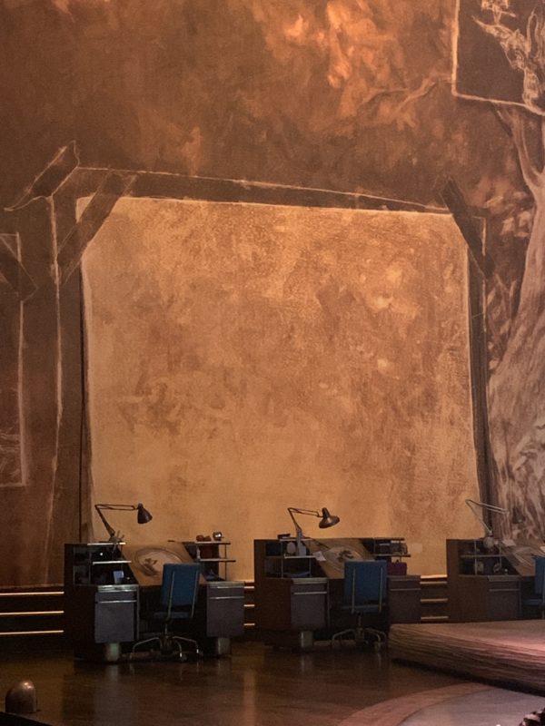 The show begins with four animator's desks on stage and a large piece of paper both on stage and on the screen. Through projection technology and live performances, the drawings come to life!