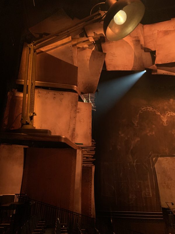 There's a large lamp on the left side of the stage that looks like Luxo!