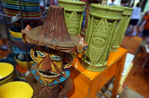 There is lots of Tiki merchandise on display.