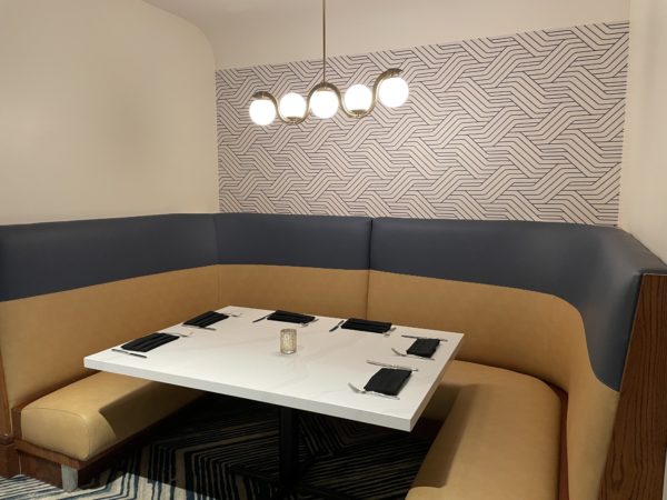 The design and colors of the restaurant have a definite 1970s feel, but with a modern twist.