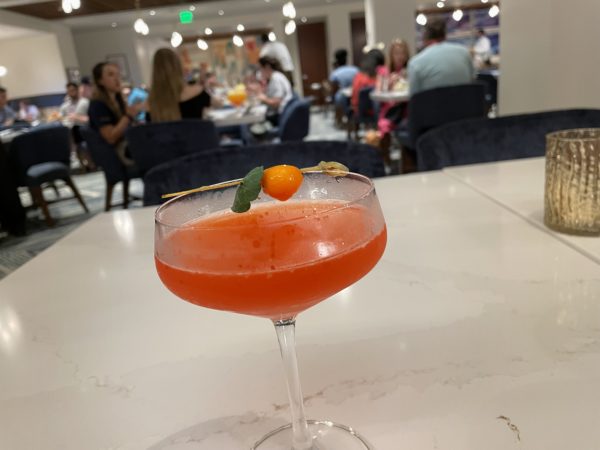The Citrus Gove Cocktail includes ampari, Green Chartreuse, Citrus Juices, Simple Syrup, and Orange Bitters.