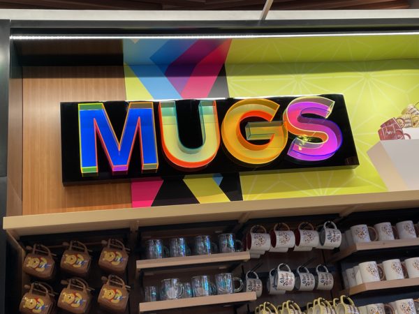 Departments of the store are labeled with colorful signs.