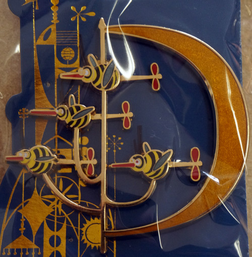 Colorful limited edition Disney Trading pin celebrating the Tower of the Four Winds: bees.