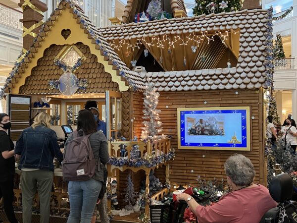 This television mounted on the outside of the gingerbread house answers the question: What happens to the Disney gingerbread after Christmas?