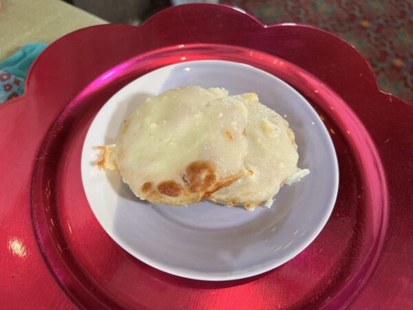 Arepa topped with Melted Queso Fresco