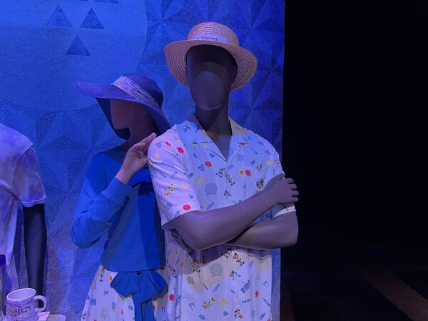 Full outfits - hats, tops, and bottoms - for ladies and gents with Mickey and Minnie EPCOT print.