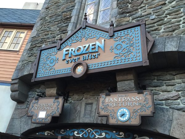 Long waits happen after this sign, but with some great Frozen scenery.