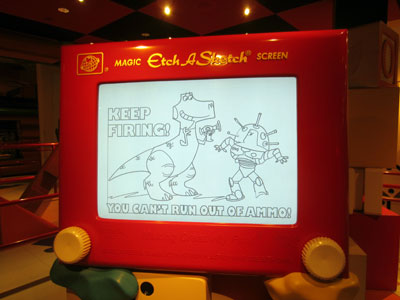 Interactive Etch-A-Sketch in Toy Story Mania Queue - YouTube