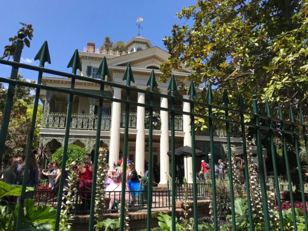 The Disneyland version of Haunted Mansion is located in New Orleans Square, so the exterior of the mansion fits that theme.