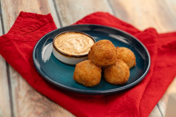 Reuben Croquettes with pastrami, sauerkraut, and Swiss cheese with Thousand Island dipping sauce