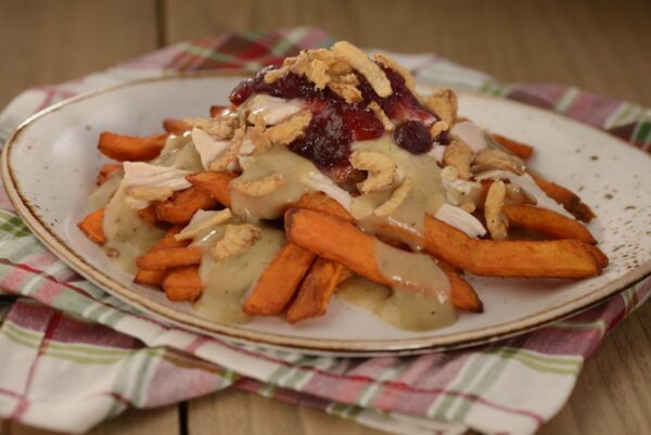 Turkey Poutine: Sweet potato fries with turkey gravy, cranberry relish, and crispy onions