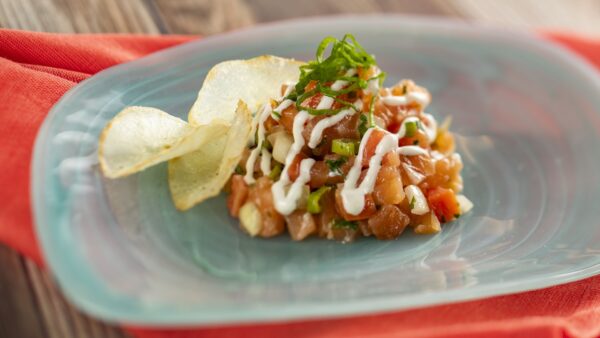 Lomi Lomi Salmon with tomatoes, onions, salmon roe, yuzu mayonnaise, and yuca chips