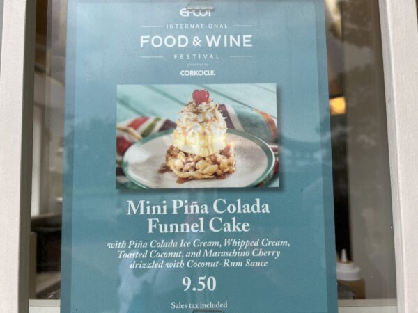 Mini pina colada funnel cake with pina colada ice cream, whipped cream, toasted coconut, and maraschino cherry drizzled with coconut-rum sauce at $9.50.