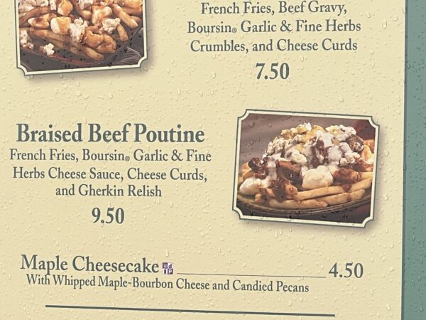 Braised beef poutine with French fries, Boursin garlic and fine herbs cheese sauce, cheese curds, and gherkin relish for $9.50.