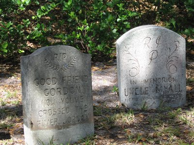 Gordon Williams tribute reads:  “Good friend Gordon, Now you've crossed the river Jordan”. Chuck Myall tribute reads:  “In memoriam, Uncle Myall, Here you'll lie for quite a while”.