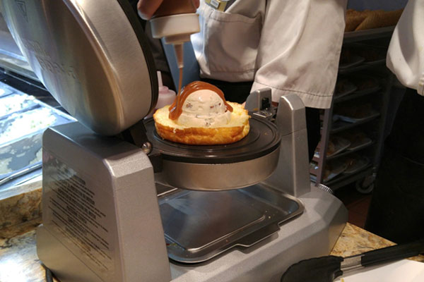 At L’Artisan des Glaces, half of the enjoyment is just watching them make your ice cream treat. 