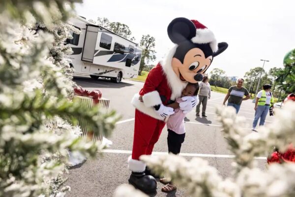 Mickey Mouse spreading smiles. Toys for Tots program. Photo Credit © Disney Enterprises, Inc. All Rights Reserved.