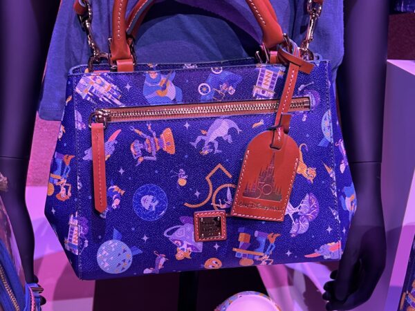 Dooney & Bourke purse with Disney World-inspired print.