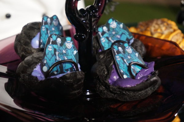 Haunted Mansion is a classic Disney dark ride, and it's especially a favorite around Halloween. This Chocolate cream puff filled with cookies and cream mousse is delicious, and it's topped with your favorite hitchhiking ghosts! You can get this treat at Aloha Isle in Adventureland.