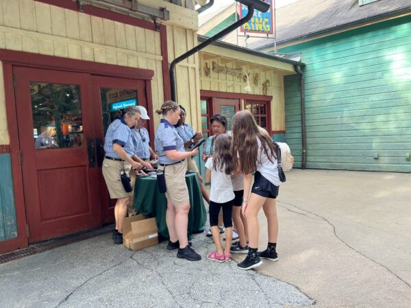Disney stationed Cast Members at the back of the shop to check passes and hand out the magnets.