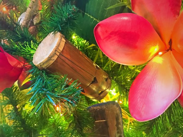 A pahu ornament representing a traditional musical instrument found in Polynesia.