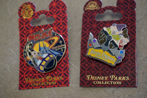Space Mountain and Seven Dwarfs Mine Train pins.