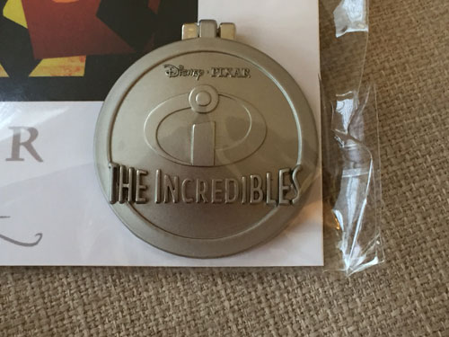 Close up of The Incredibles emblem.