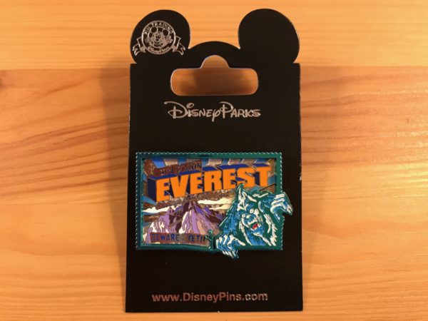 Mark your journey with this fun postcard pin.