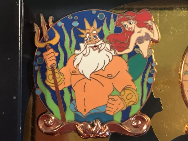 Ariel and her father appear in this pin.