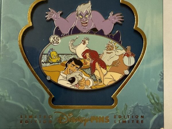 The jumbo pin show Ursula, Arial, Prince Eric, and other characters from the Disney animated classic.