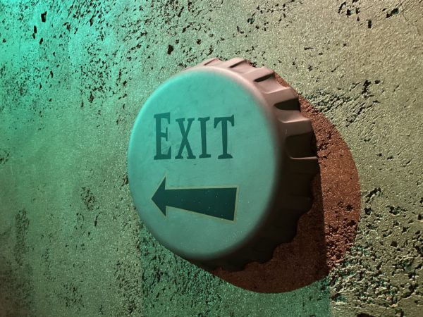 The bottlecap exit sign shows the way out.