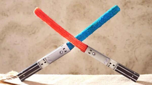 Lightsaber Churro served with chocolate sauce. Photo credits (c) Disney Enterprises, Inc. All Rights Reserved