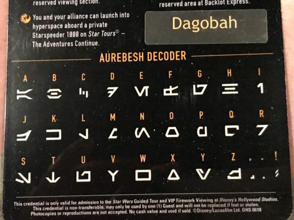 Use the Aurebesh decoder on the back of your lanyard.