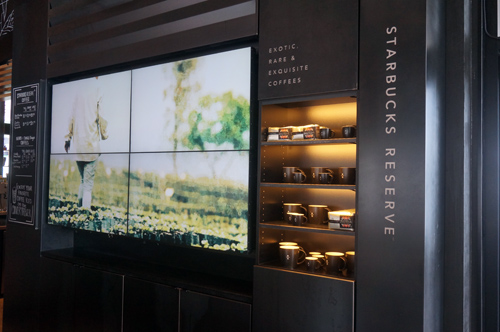 Starbucks Reserve location features a video wall.